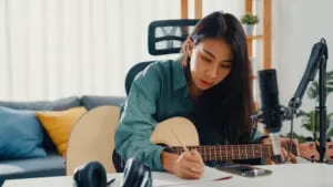 woman creating music for fun winter indoor hobby on her day off