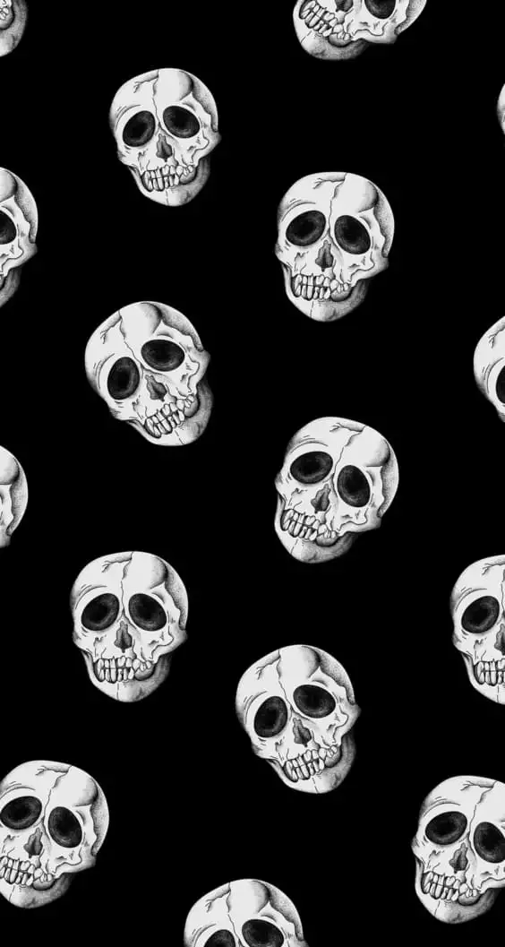 black wallpaper with white skulls