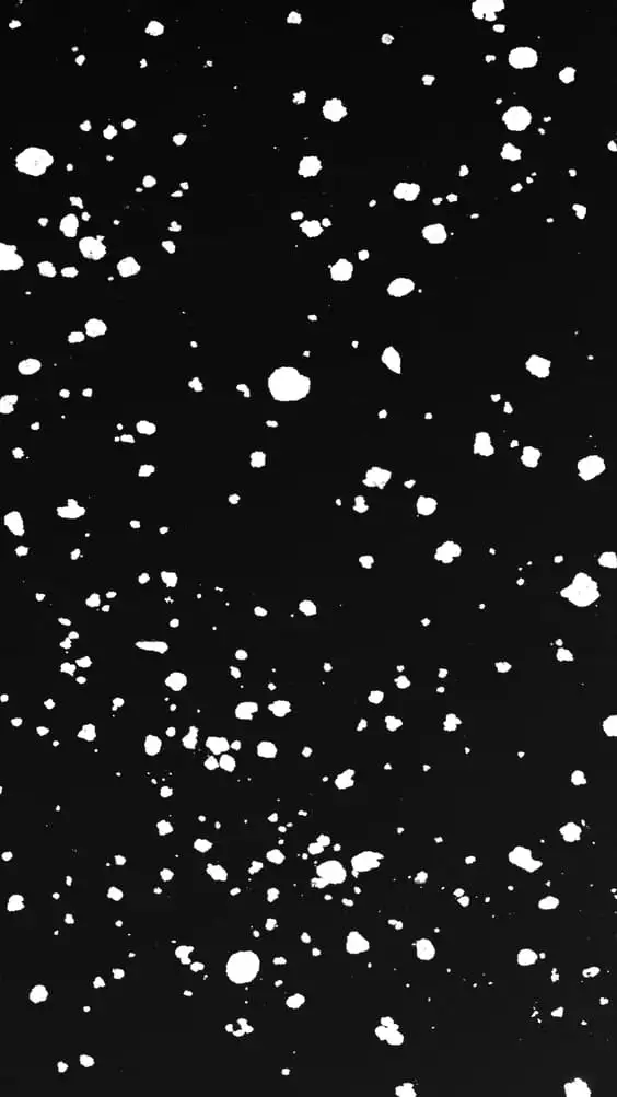 plain black wallpaper background with white dots