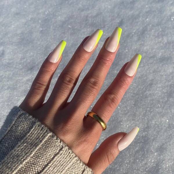 Yellowy green colored french tip nails