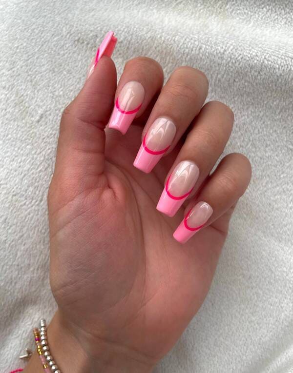 Pink colored french tip press on nails