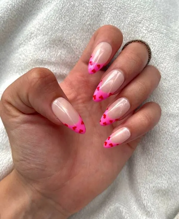 Pink hearts french tip nails