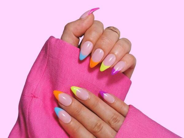 Bright rainbow gradient french tip nails