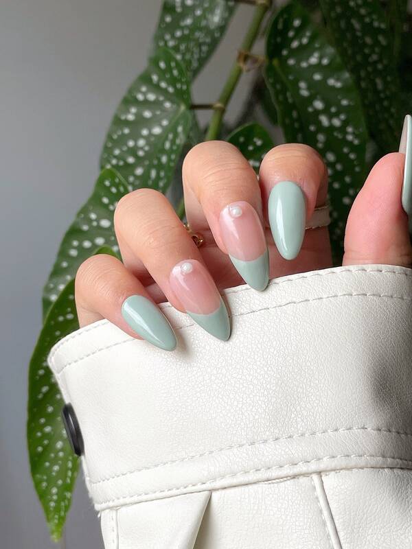 Sage colored french tips with pearls nails