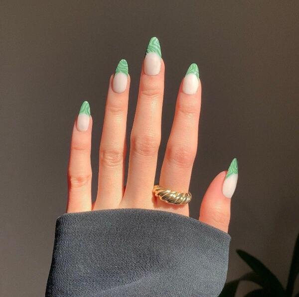 Abstract swirly green french manicure