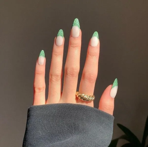 Abstract swirly green french manicure
