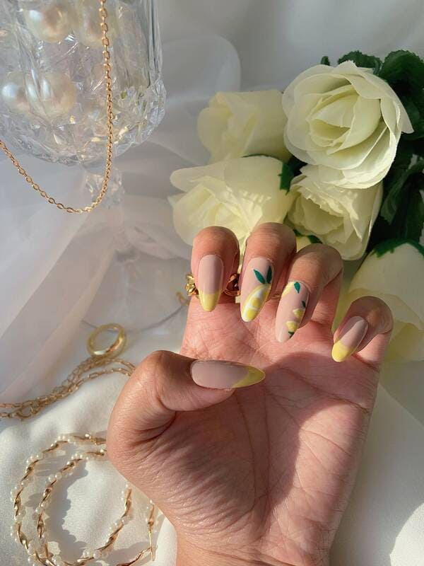 Lemon drop yellow french tip nails