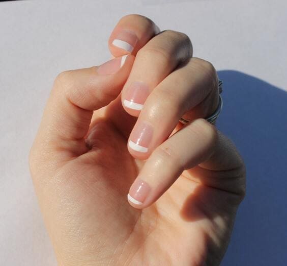 Classic white french nails.