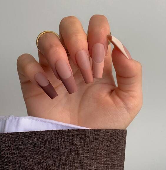 Different shades of light brown french nails.