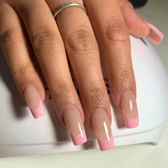 Pink french tip nail.
