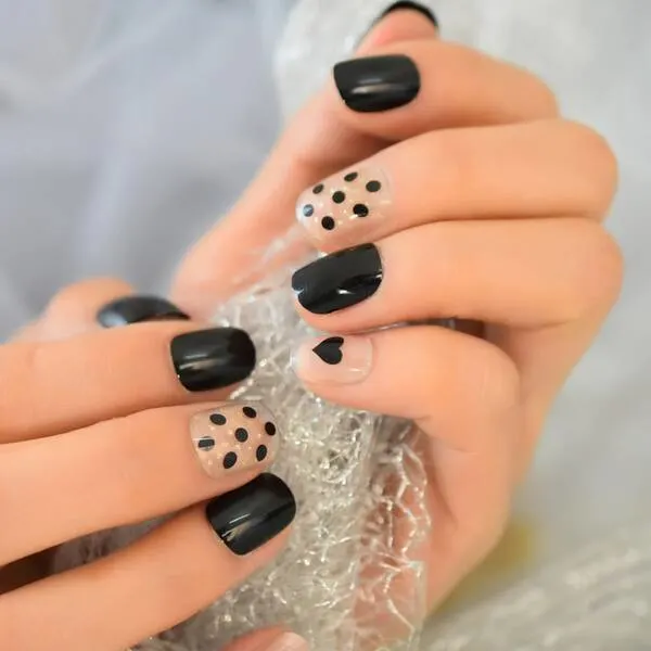 Black spots with hearts short nails