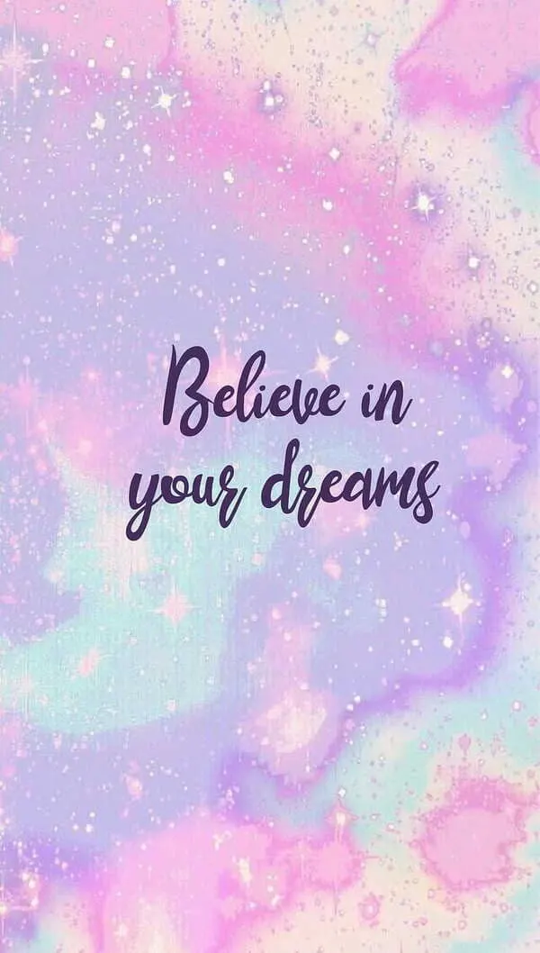 "believe in your dreams" quote with soft pastels colors
