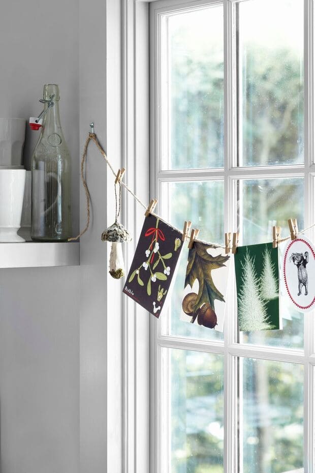 Christmas Card Window Display with mini clothes pins