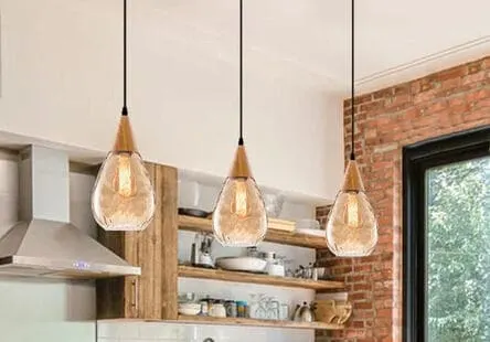 glass pendant light with a wooden feature on Etsy!