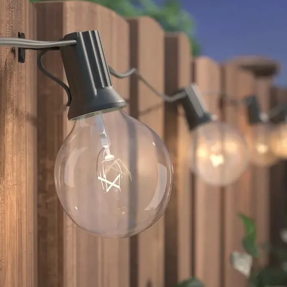 Hang String Lights for your tiki bar in your garden