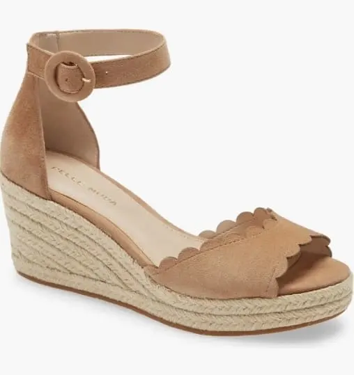 Soft taupe suede espadrille wedges with scalloped straps and a woven heel