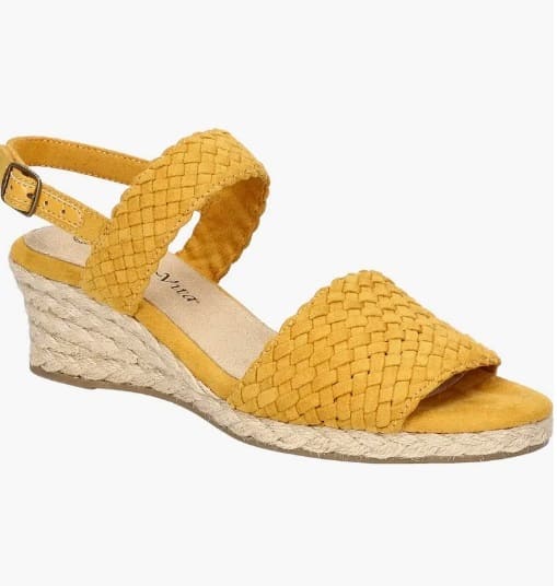 Mustard yellow woven espadrille wedges with a textured design and braided jute sole