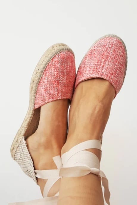 Coral textured espadrille flats with ribbon ties for a sweet, summery look.