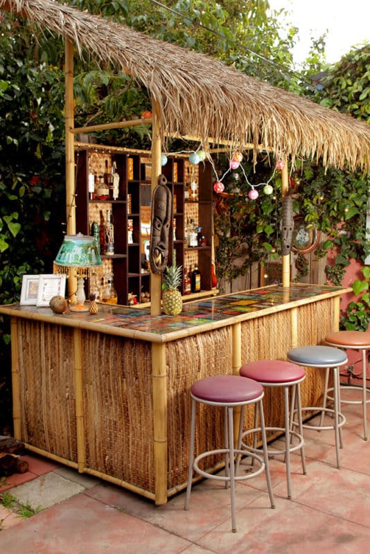 authentic tiki bar tropical beach look with thatch roof