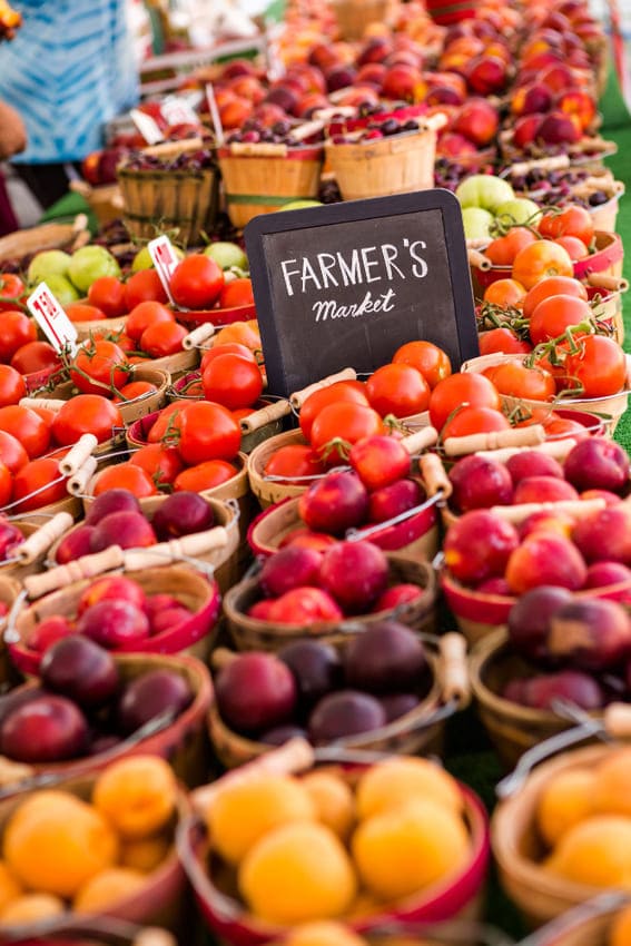 farmers market of fruit with pits