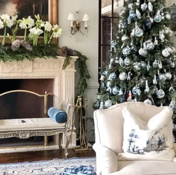 Opulent blue and white themed Christmas tree.