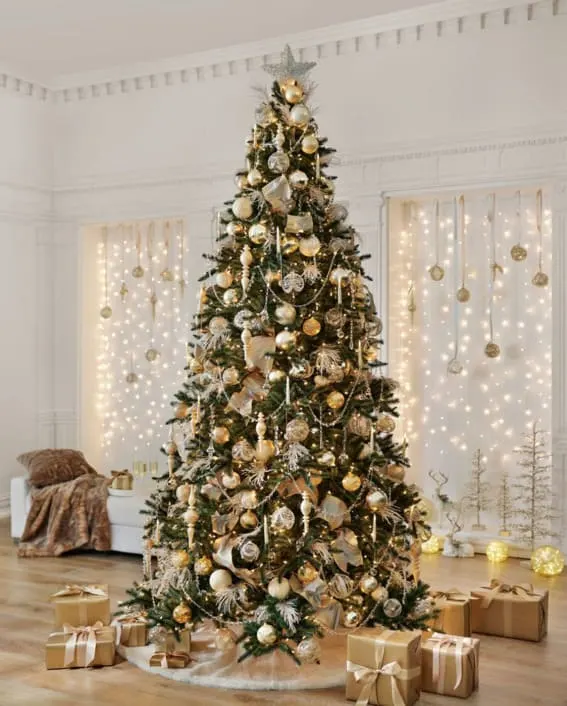 Luxurious Balsam Hill Christmas tree adorned in gold.