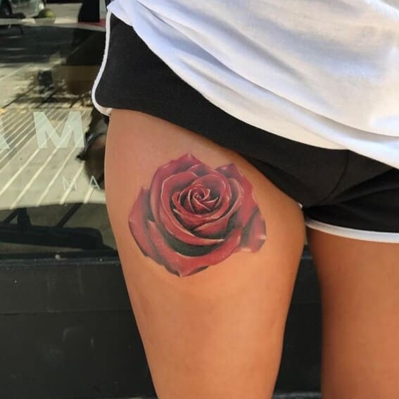 rose red on leg tattoo