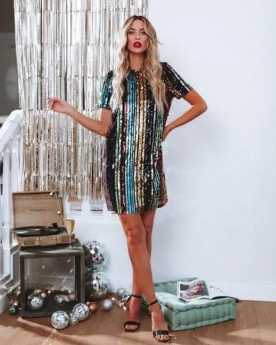 Model in a sequined holiday party dress 