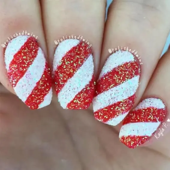 Short nails with glittery candy cane stripes