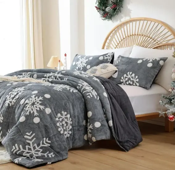 Full-size dark grey velvet comforter set with white snowflake design.