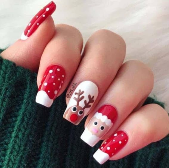 Short nails with cute Santa and Rudolph designs and polka dots