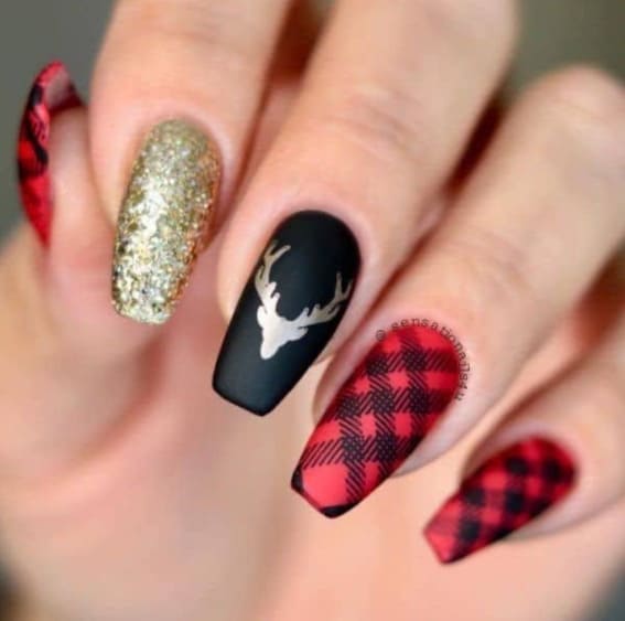 Short nails with black matte, gold glitter, and tartan patterns