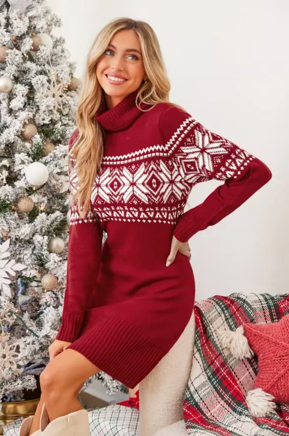 Model in a red Fair Isle sweater dress.