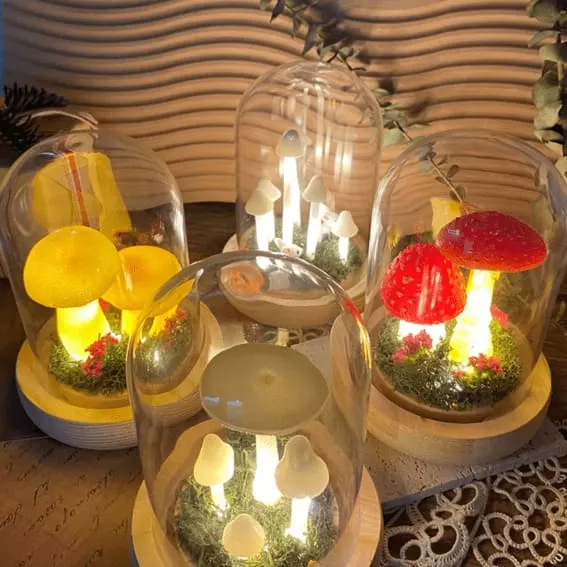4 unique cottage core night lights or lamps filled with tiny cute handmade mushrooms 