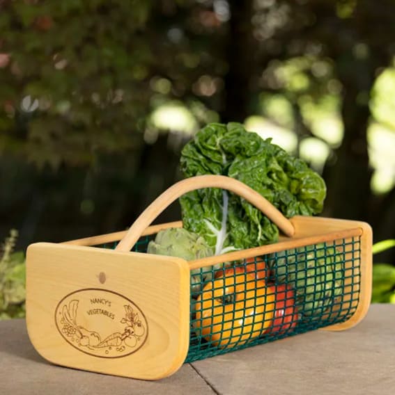 wooden harvest basket full of fresh produce.