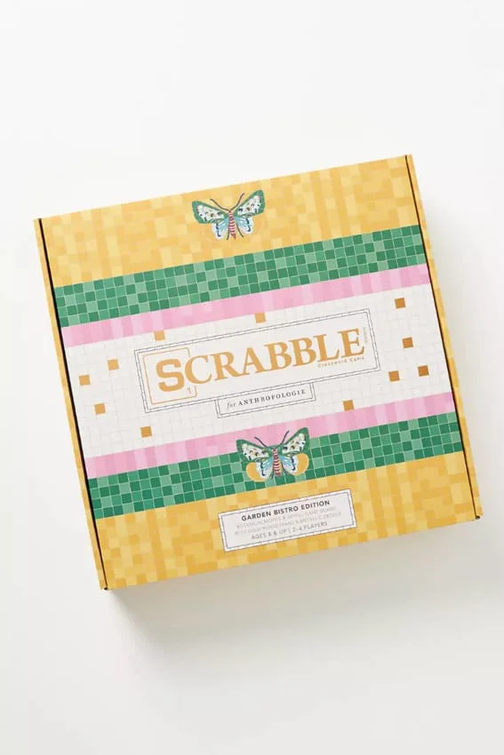 A designer Scrabble game with wooden tiles and racks.