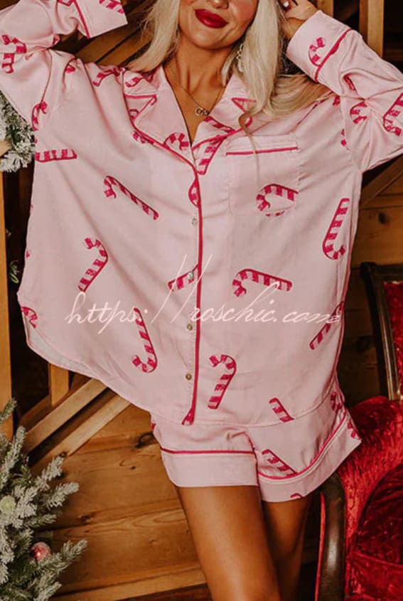 Woman in candy cane printed pajama set.