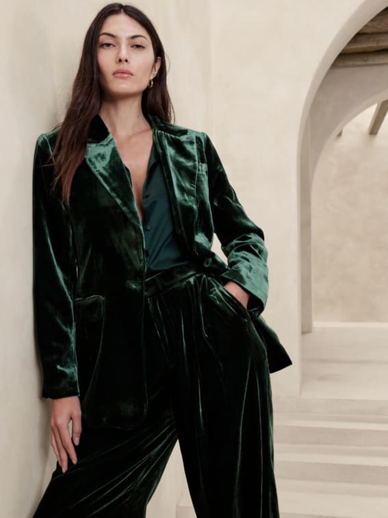 Model in a sumptuous green velvet suit from Banana Republic