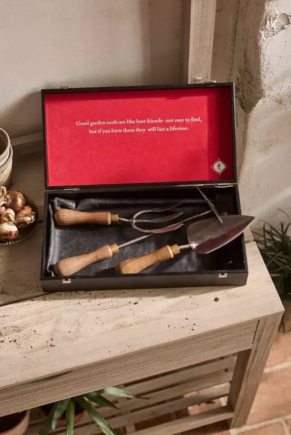 A trio of titanium-coated, handcrafted gardening tools in a classic presentation box.