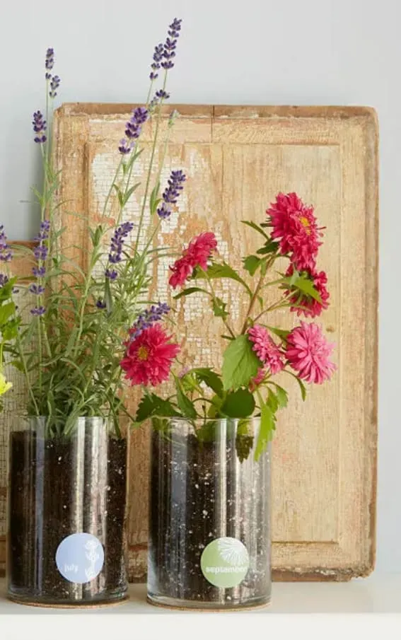 Elegant vases featuring blooms corresponding to different birth months.
