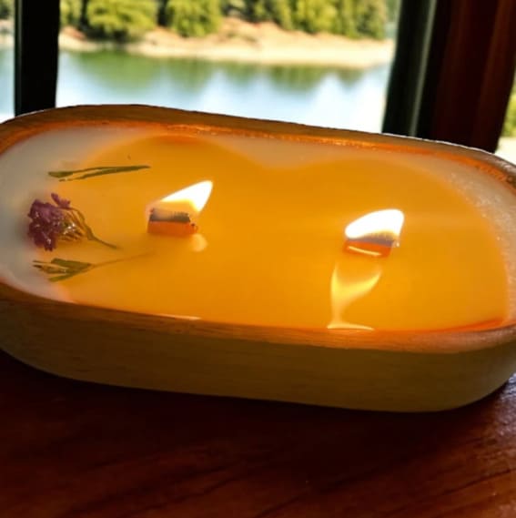 Dough bowl candle with multiple wicks and embedded flowers