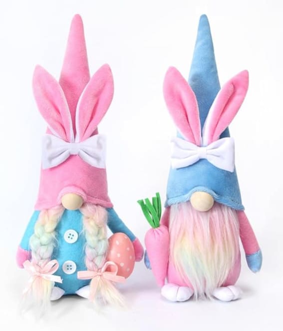Two handmade Easter gnomes dressed in bunny costumes with pastel accents.
