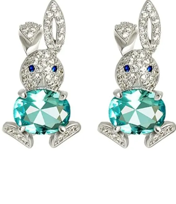 Sparkling Easter bunny earrings with aqua blue gem bodies and blue gem eyes.