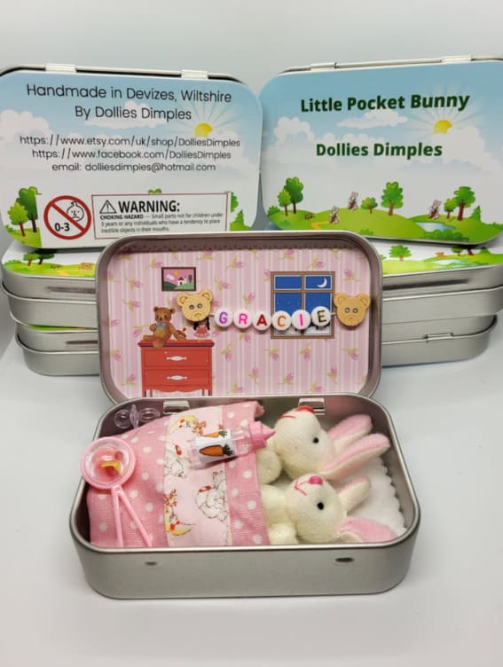 Tiny plush bunny family in a hand-decorated pocket tin
