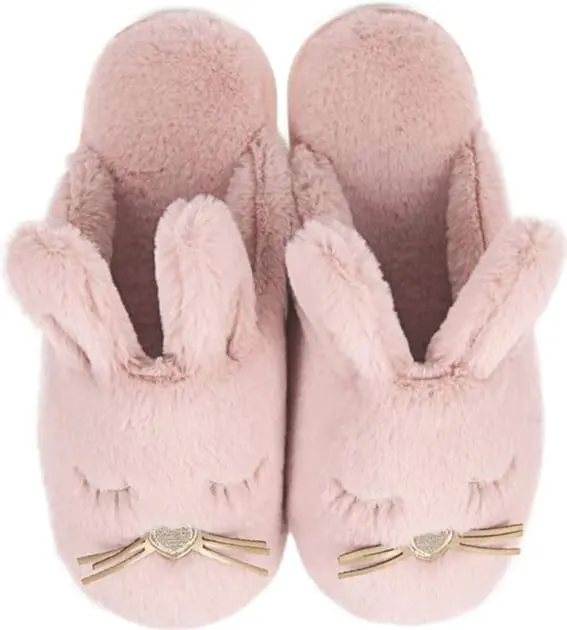 Plush pink bunny slippers with heart-shaped nose and decorative bow detail.