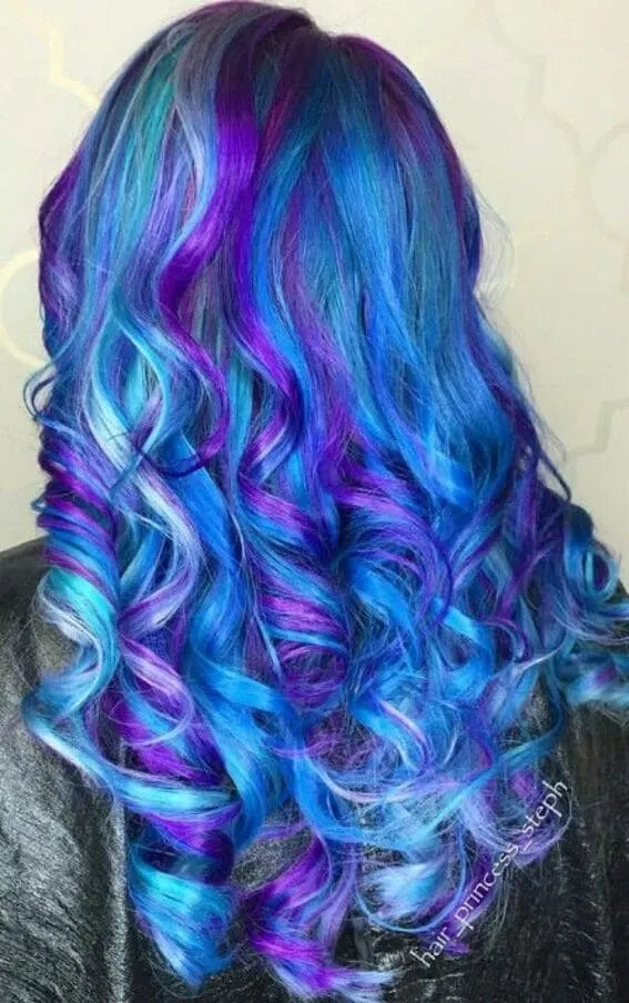 Electric blue curls glowing with confident energy.
