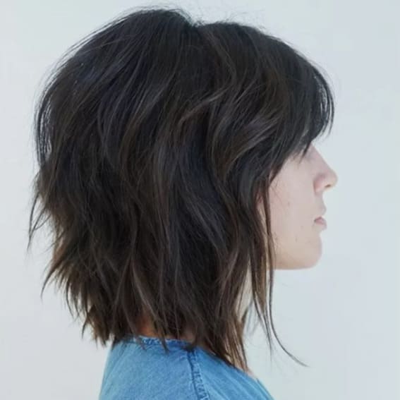 Short layers, tapered ends, and a slight angle.