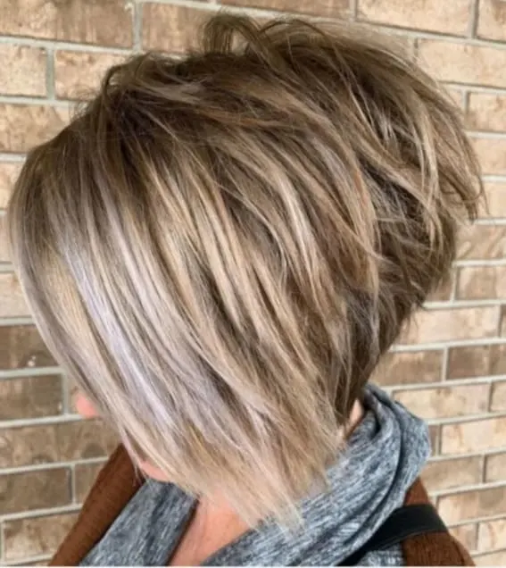 Shaggy, inverted bob with a dramatic color transition.
