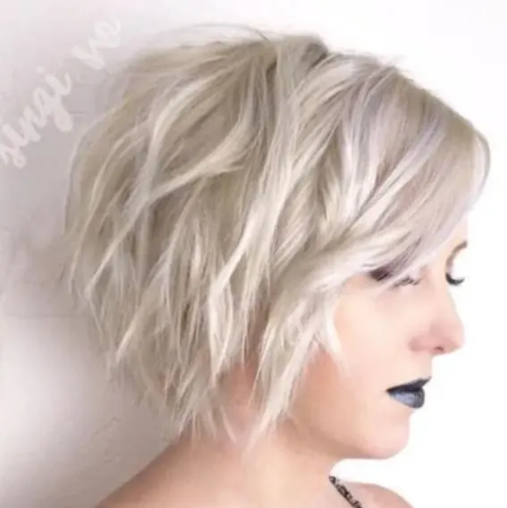 Platinum blonde hair brings fun and easy maintenance to this shortcut.