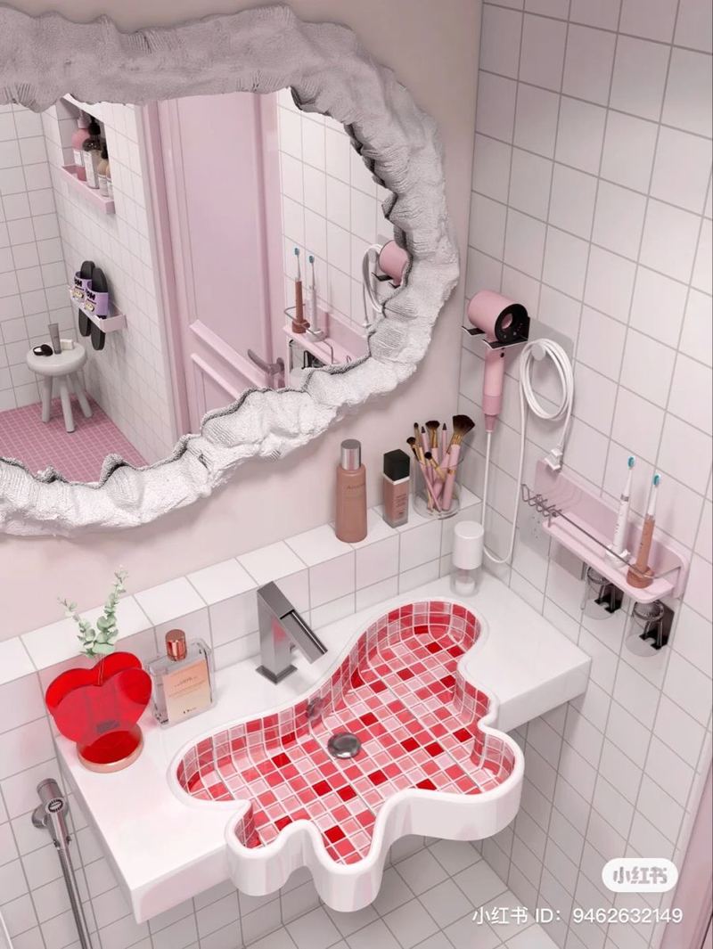 Small pink bathroom with a red tile sink